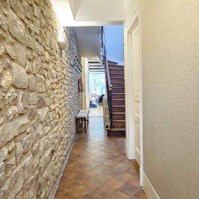 Hallway from front door to open plan kitchen and dining area